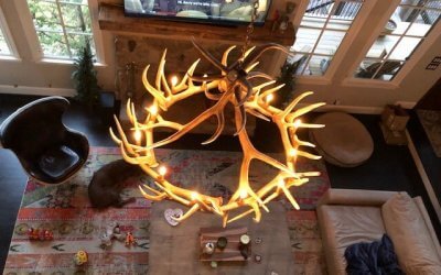 Wagon Wheel Chandeliers vs. Antler Lighting: Which Rustic Fixture Fits Your Space?